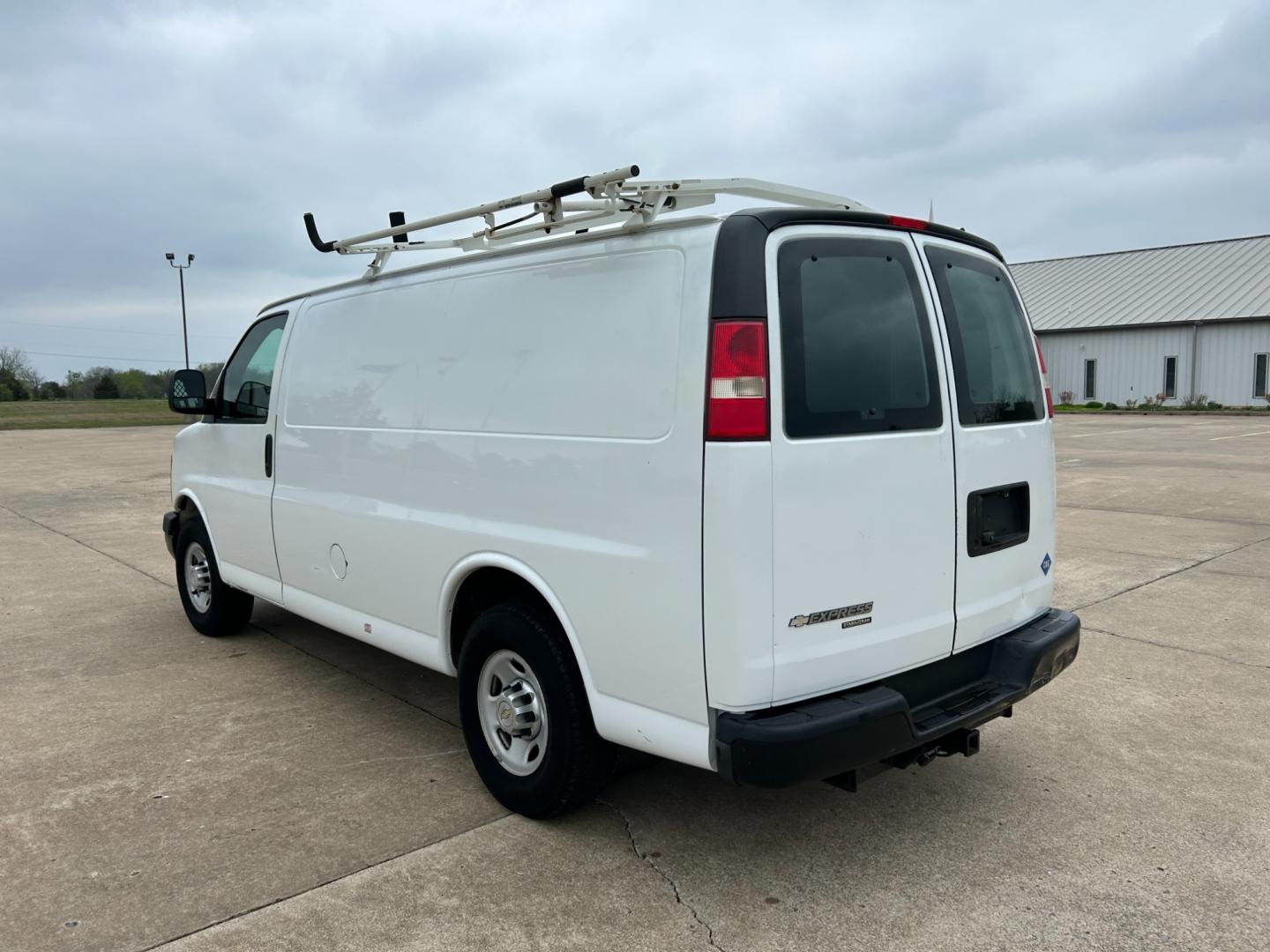 2011 White /Gray Chevrolet Express 2500 Cargo (1GCWGFCB9B1) with an 3.6L V6 DOHC 16V engine, 4-Speed Automatic transmission, located at 17760 Hwy 62, Morris, OK, 74445, (918) 733-4887, 35.609104, -95.877060 - 2011 CHEVY EXPRESS HAS THE 3.6L V6 ENGINE. THIS IS A DEDICATED CNG (ONLY RUNS ON COMPRESSED NATURAL GAS). MANUAL SEATS, MANUAL LOCKS, MANUAL, MIRRORS, MANUAL WINDOWS, AMFM STEREO, A/C, LEATHER SEATS, LEATHER-WRAPPED STEERING WHEEL, TRACTION CONTROL, LOCKING METAL CONSOLE, STEEL SHELVES, SPLIT SWING- - Photo#6